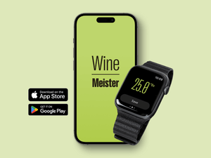 Smartphone and smartwatch on a pale green background displaying the 'Wine Meister' app, with the phone screen showing the app title and the watch revealing a specific gravity reading of 25.0°Bx. Next to the phone, logos indicate app availability on the Apple App Store and Google Play, highlighting the integration of winemaking technology with mobile and wearable devices.